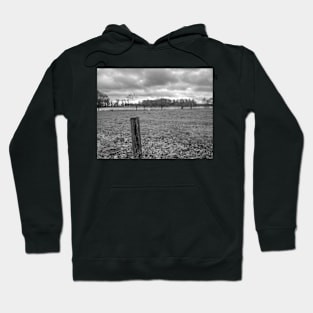 Wooden fence post in the English countryside Hoodie